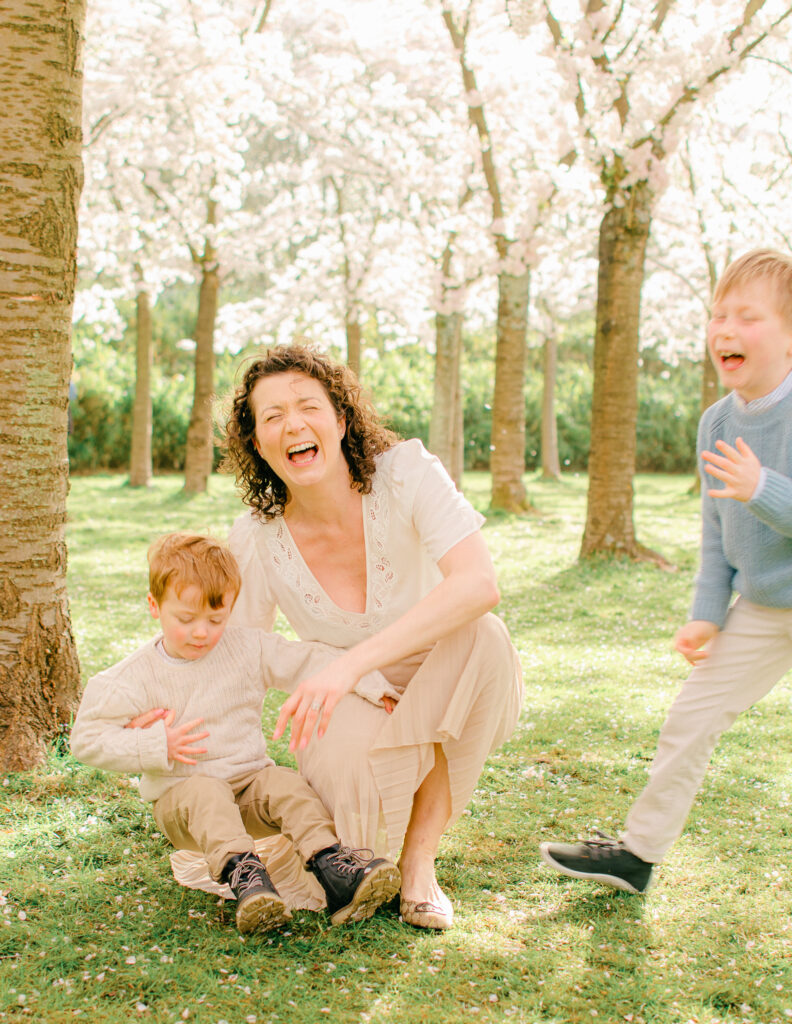mother laughing with sons