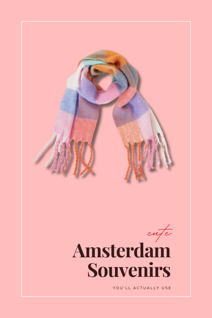 to show amsterdam tourists the cute scarf they can get from the albert cuyp markt