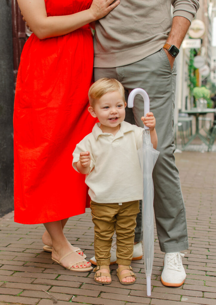 toddler with clear umbrella