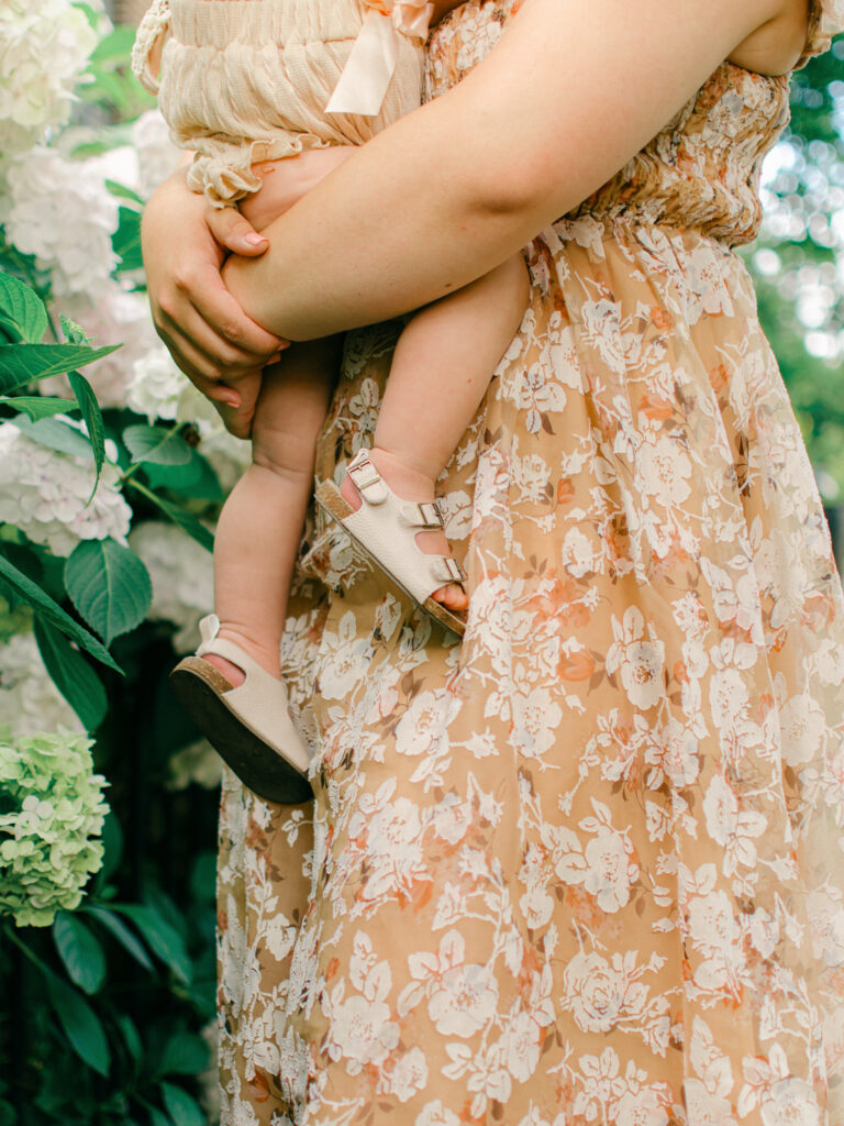 Editorial-style image of a mother holding her daughter.