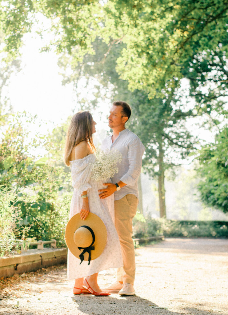 Gentle candid moment during summer maternity photoshoot in Amsterdam.