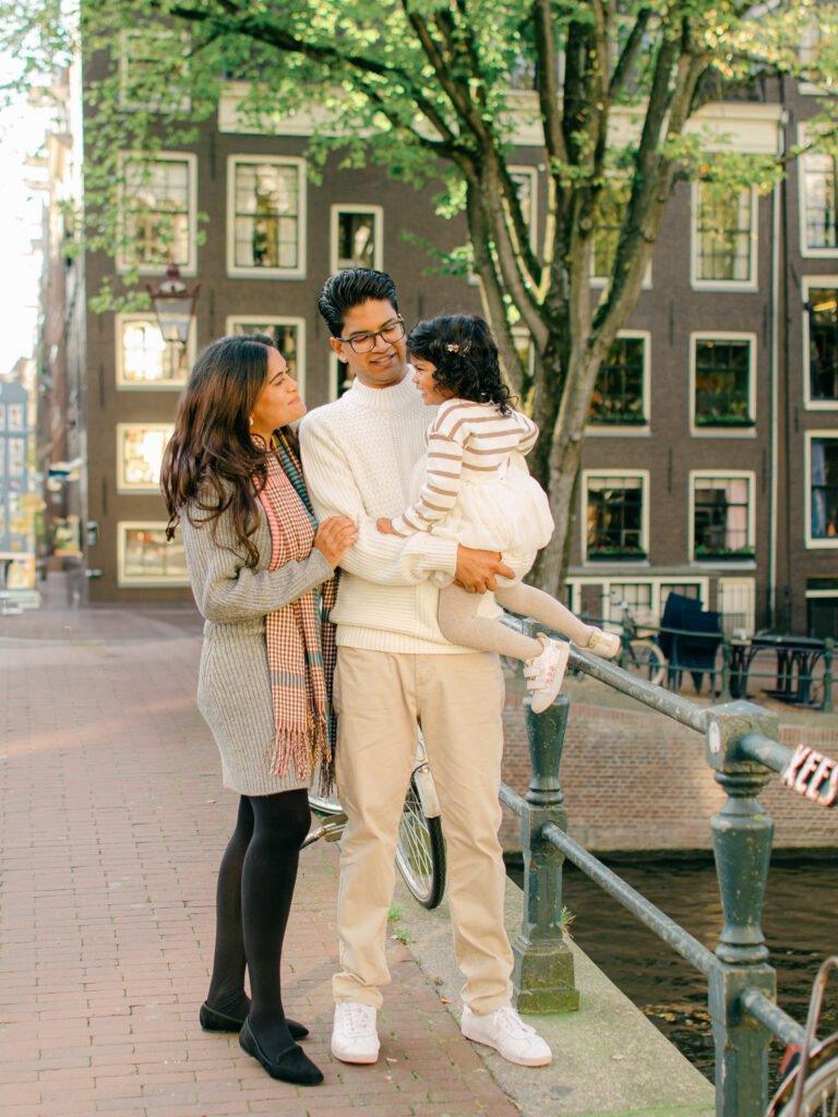 Soft and elegant portrait of a small family in Amsterdam.