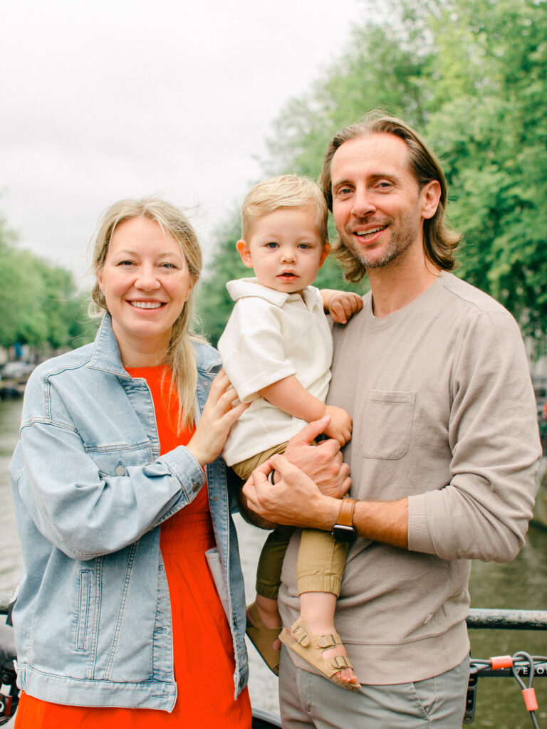 Close up shot of a family of three in Amsterdam Nine Streets.