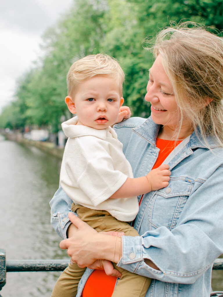 Little boy starts to get sleepy during a family photoshoot in Amsterdam.