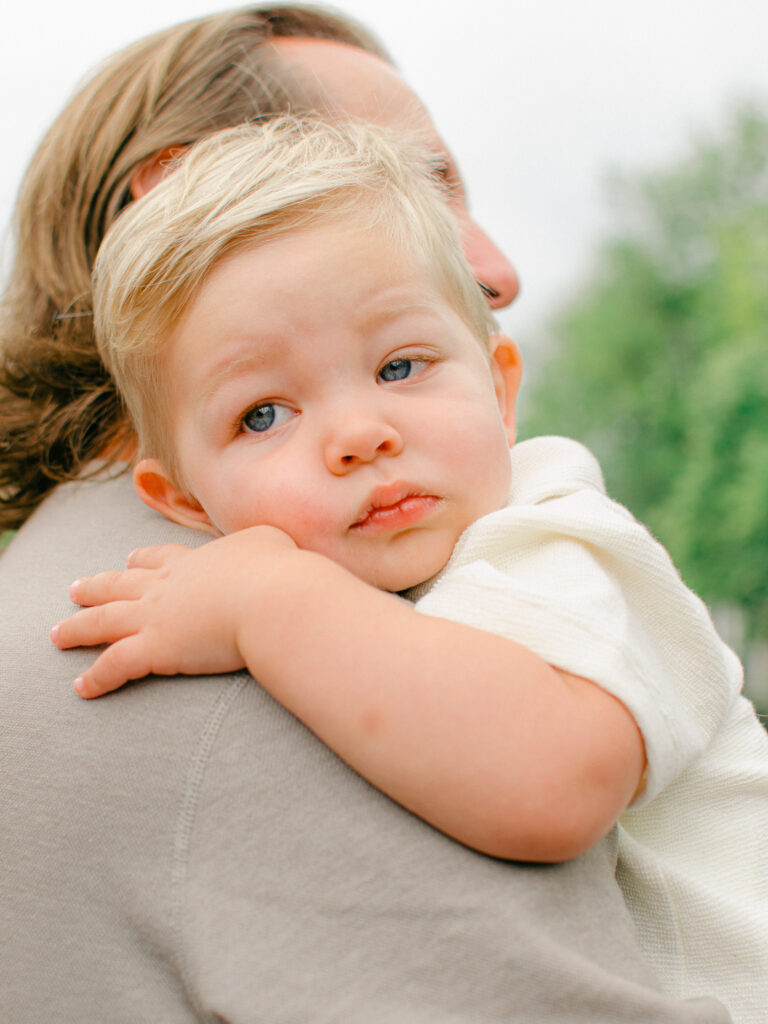 Baby boy is very sleep during his family photoshoot in the Nine Streets.