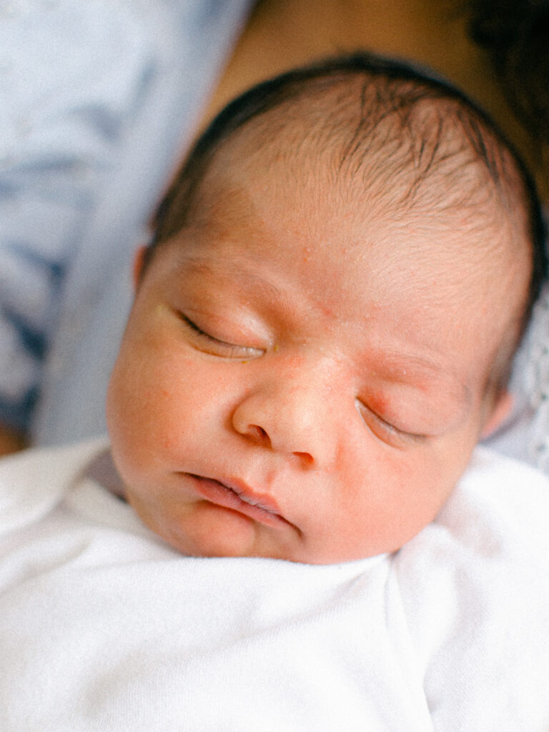 Close up of newborn baby's face.