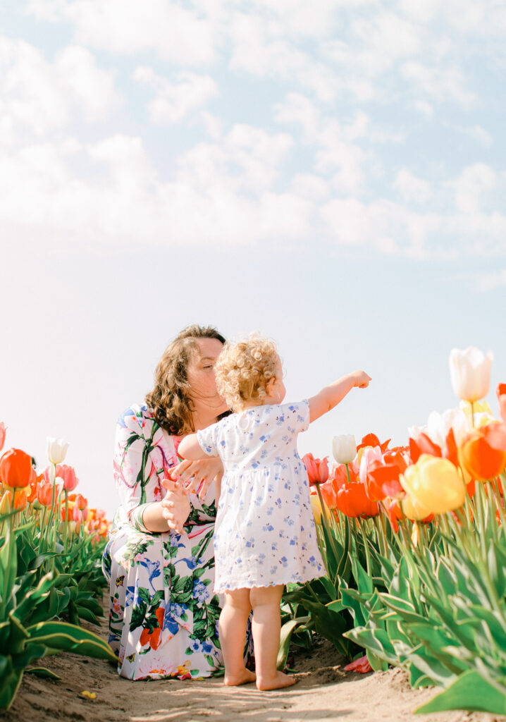 mother and daughter in the tulip fields